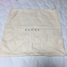 GUCCI のバッグの袋グレー