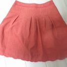 [未使用]オレンジ　スカート　Ｍサイズ
