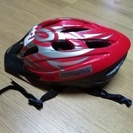 自転車用の赤いヘルメット（Lサイズ）を1000円で
