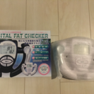 ハンディタイプのデジタル体脂肪測定器