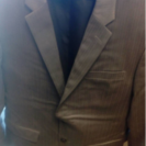 タケオキクチのグレーのスーツ