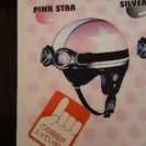 子供用のピンクのヘルメットです