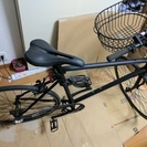 TOKYO BIKEの黒(2012年購入）のクロスバイクと空気入れ