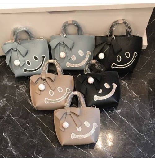 ニコちゃん本革リボンバッグ