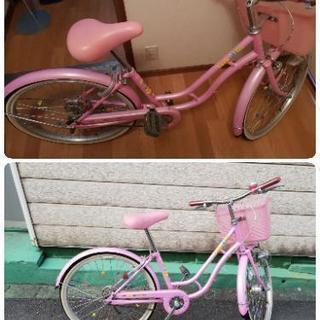 小、中学生用のピンク色の自転車