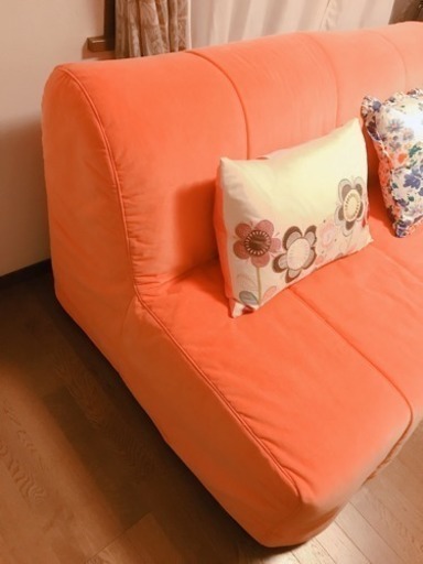 IKEAソファベッド(オレンジのカバー付き)