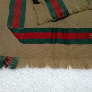 GUCCIオーバンストール(本物) このGUCCIのマフラーのタグを見て本物でしょうか？中古品ですが