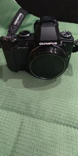 取引中 OLYMPUS stylus 1s