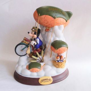 ディズニー･カンパニー 陶磁器 フィギュア 雲の中飛行船の自転車をこぐミッキー