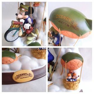 ディズニー･カンパニー 陶磁器 フィギュア 雲の中飛行船の自転車をこぐミッキー