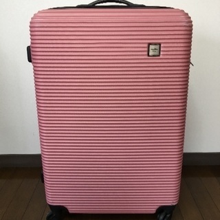 ピンク色のスーツケース