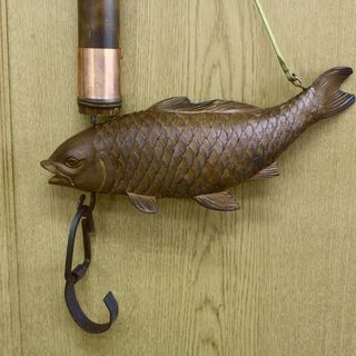 自在鉤　　木製の鯉の横木