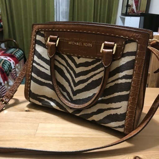その他 USED Michael Kors Sling bag .