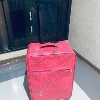 ピンクの機内持ち込み用スーツケース