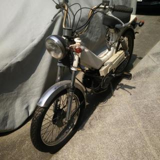 取引済　TOMOS