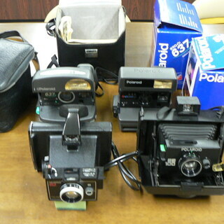 ポラロイドカメラ４台（革ケース、箱付き）無料で差し上げます。