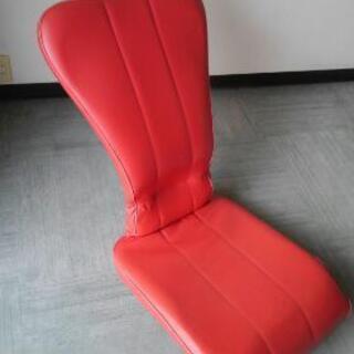 商談中　赤い座椅子