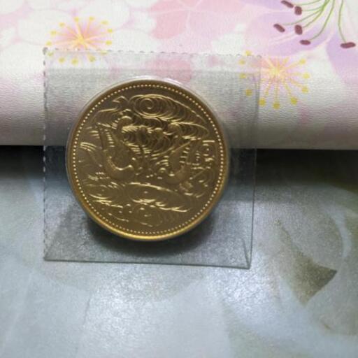 天皇御在位六十年記念１０万円硬貨