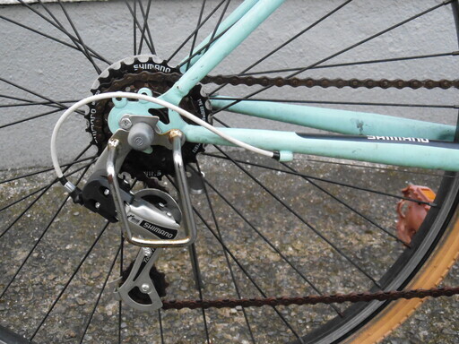 中古自転車 シティークロス シマノ外装6段 Vブレーキ 色ライトブルー  26インチ メーカーサイクルショップカイトのPB品
