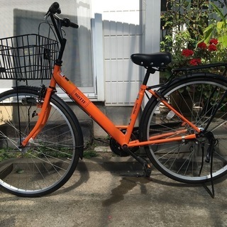 27インチオレンジの自転車 Maruishiシティサイクル