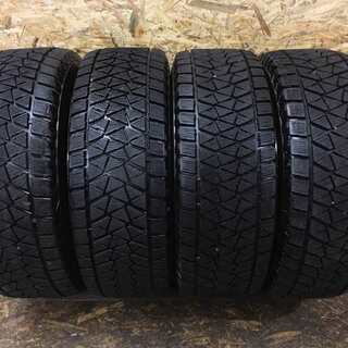 BS BLIZZAK DM-V2 265/70R15 15インチ スタッドレス 4本 2018年製 ハイラックスサーフ パジェロ テラノ等 (TF281) クレジットカード QR決済可能