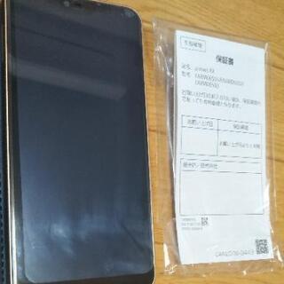 手帳型ケース付き。arrowsRXゴールド 保証書付きシムフリースマホ