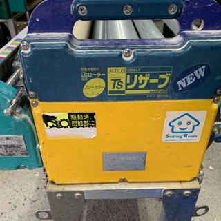 クロス糊付け機　①