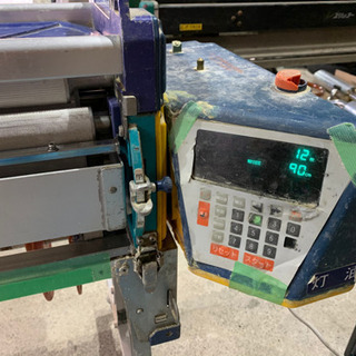 クロス糊付け機　①