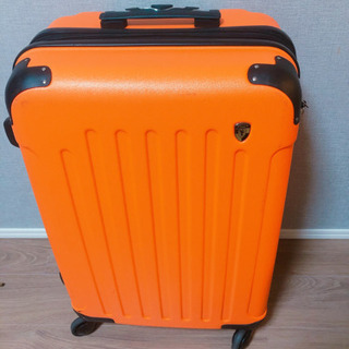 無料です: 鮮やかなオレンジ色のスーツケース