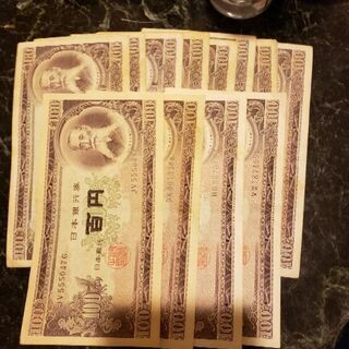 新品の500円札と100円札