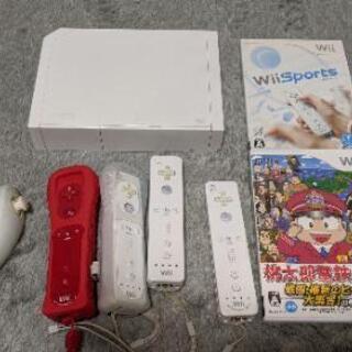 Wii本体＋リモコン4本（ヌンチャク1本）＋ゲームソフト2枚