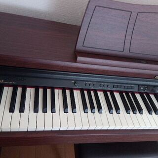 ローランド電子ピアノ2009年製 HP205GP