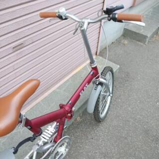 決まりました！札幌市内配達無料。中古折りたたみ自転車ワインカラー。