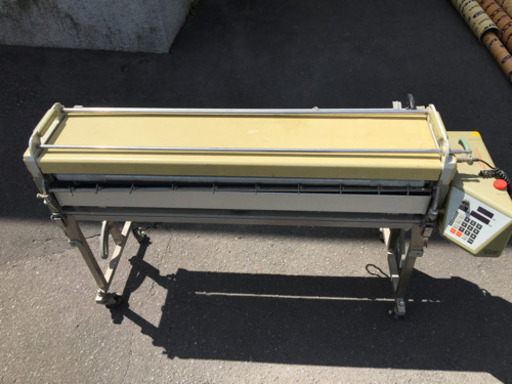 クロス糊付機