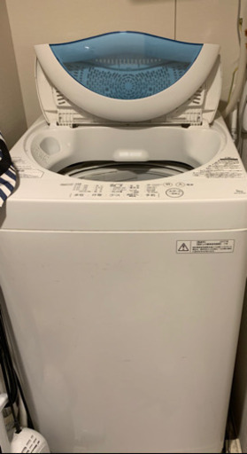 女性の洗濯機