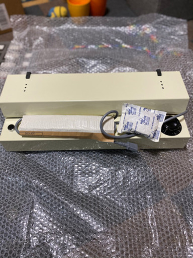 コニカ
