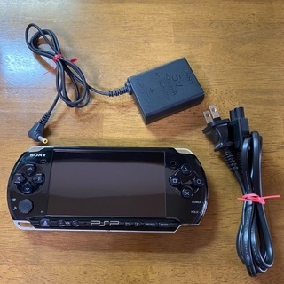 PSP本体と充電器（ソフト２つ）