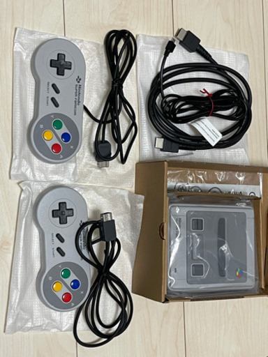 近場は配送します。スーパーファミコンミニと、おまけのゲーム機