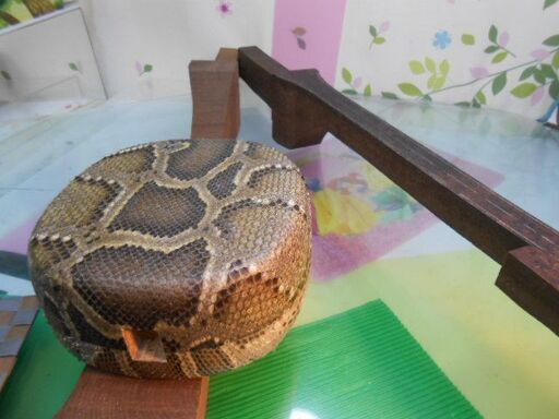 35.000円 沖縄三線専用 鉄木二本セットと蛇皮強化(二重