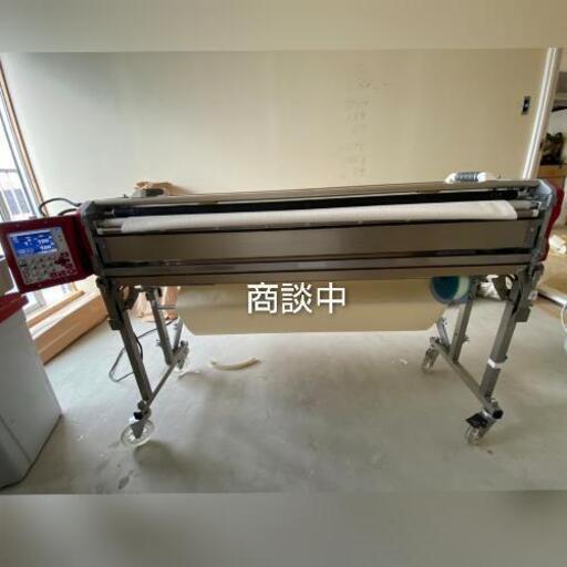 クロス自動糊付け機