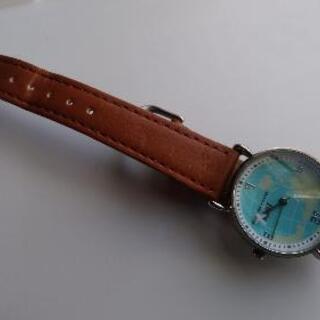針が✈️の腕時計