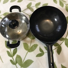 新品の中華鍋と中古鍋