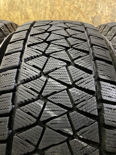 BS BLIZZAK DM-V2 265/65R17 17インチ スタッドレス 4本 2017年製 バリ溝 ランクルプラド ハイラックスサーフ等　(TF648)クレジットカード QRコード決済可能