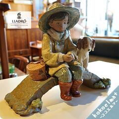 スペインLLADRO(リヤドロ)社の陶器人形の置物『フィギュリン』THE OLD FISHING HOLE/2237 です。魚釣りをする男の子に寄り添う仔犬が愛らしい作品です。贈答品/プレゼントBL429