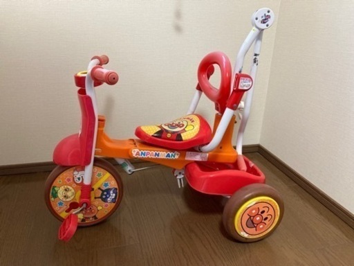 人気のファッションブランド! アンパンマン三輪車 補助棒付き - 三輪車/乗り物