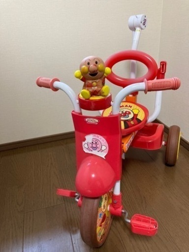 人気のファッションブランド! アンパンマン三輪車 補助棒付き - 三輪車/乗り物