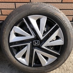 ホンダ　フィットシャトル　純正スチールホイールキャップ付きタイヤ