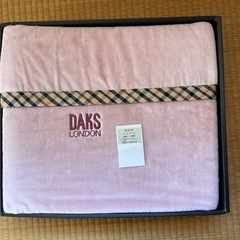 ピンクの綿毛布