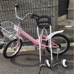 幼児用自転車（ピンク）とアンパンマンヘルメット