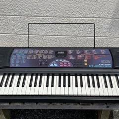中古　CASIO 光る 電子ピアノ 100曲搭載 CTK-560...
